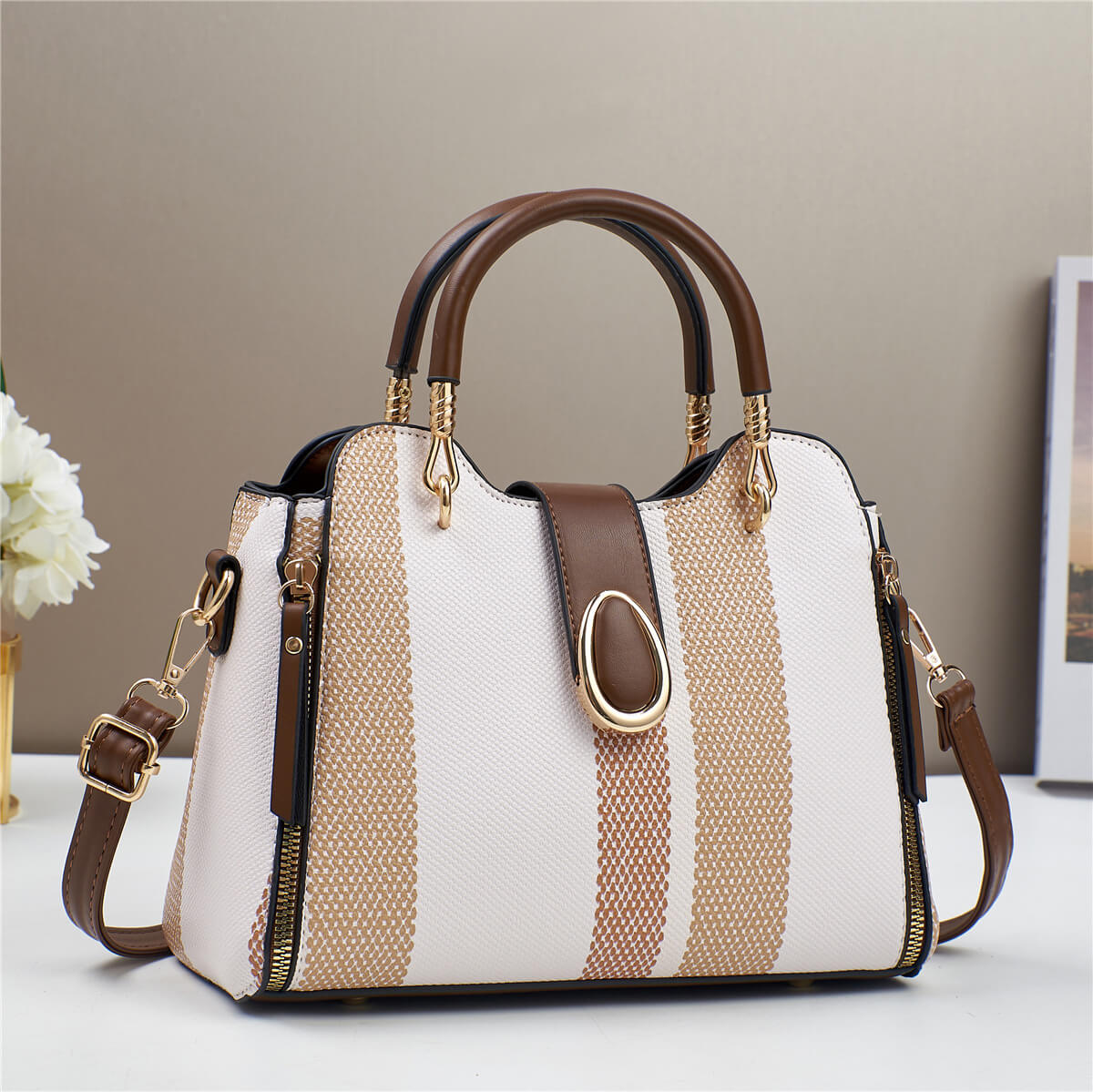 Striped Bag with Gold Detail: Summery, Structured, and Elegant