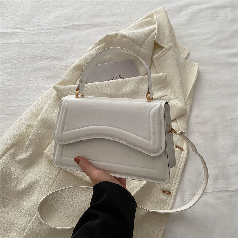 Small Shoulder Bag with Wave Stitching: Minimalism with Character