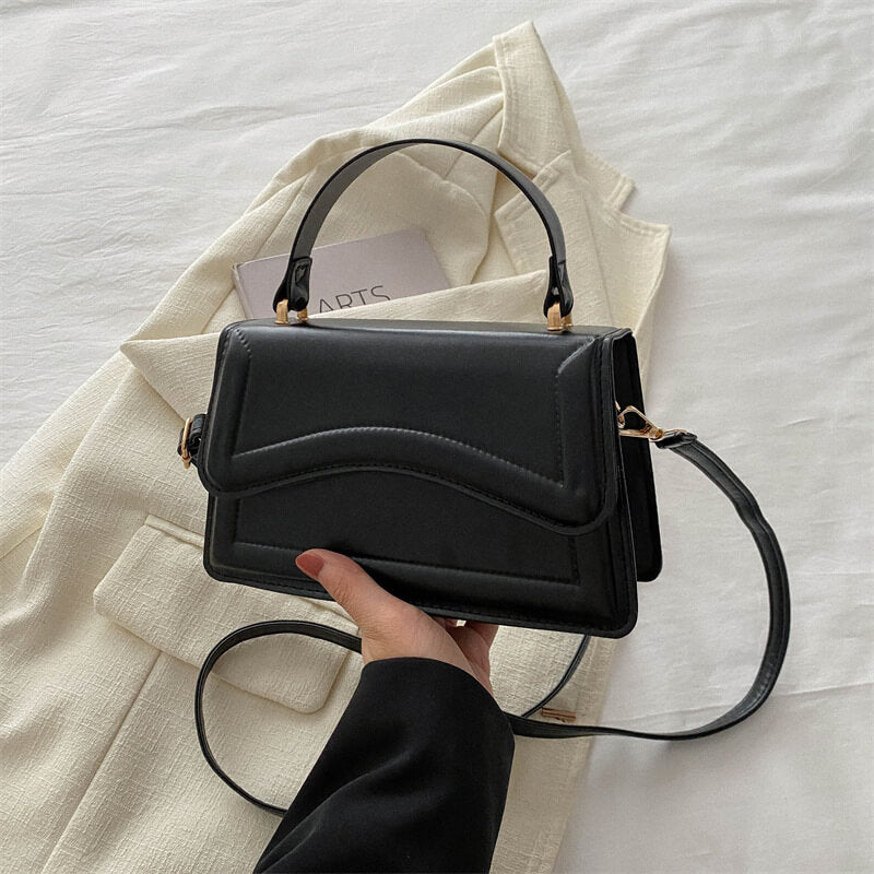 Small Shoulder Bag with Wave Stitching: Minimalism with Character