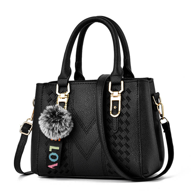 Handbag with Charm: Clean Look with a Playful Twist