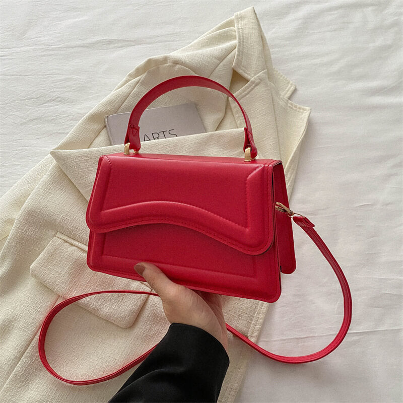 Small Shoulder Bag with Wave Stitching: Minimalism with Character