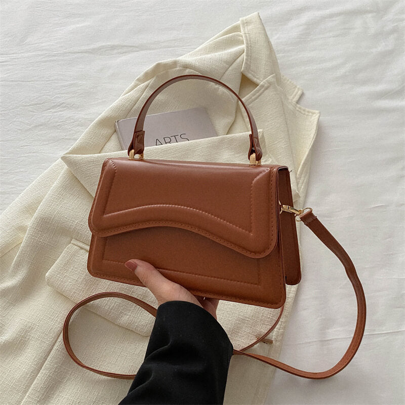 Small Shoulder Bag with Wave Stitching: Minimalism with Character