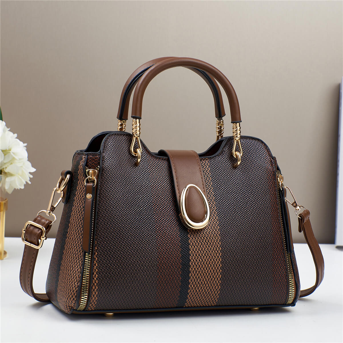 Striped Bag with Gold Detail: Summery, Structured, and Elegant