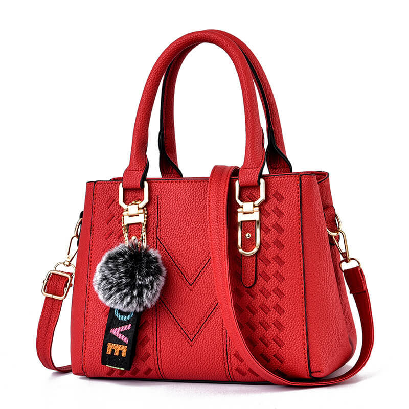 Handbag with Charm: Clean Look with a Playful Twist
